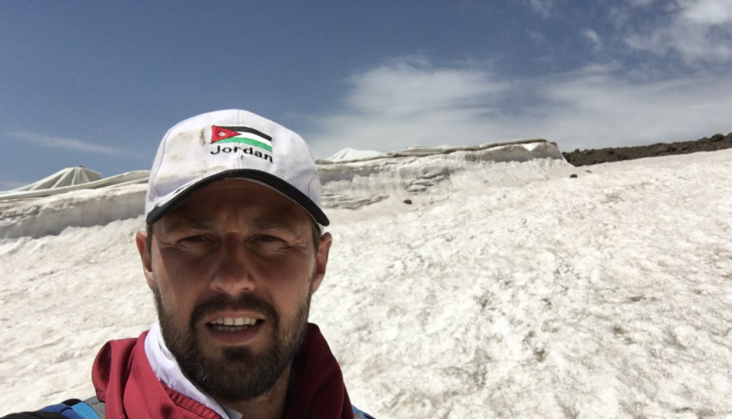 Andžejs Reiters uz kalna sniegā